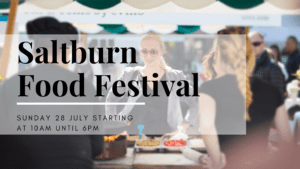 Image showing a woman buying food at a food festival